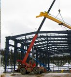 Using Crane to Erect a Steel Building